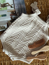 Personalised wooden baby hairbrush, comb and bristle brush set, engraved with name, styled with knitted romper