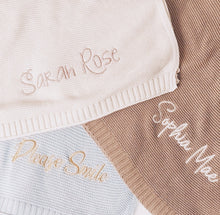 Personalised cotton knit baby blankets in cream, dusty blue and camel, embroidered with names and phrases